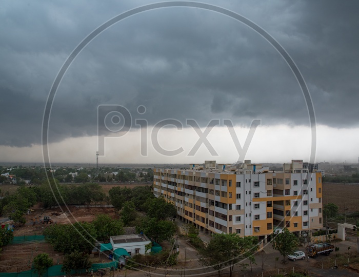Clouds hovering around an appartment in Mangalagiri