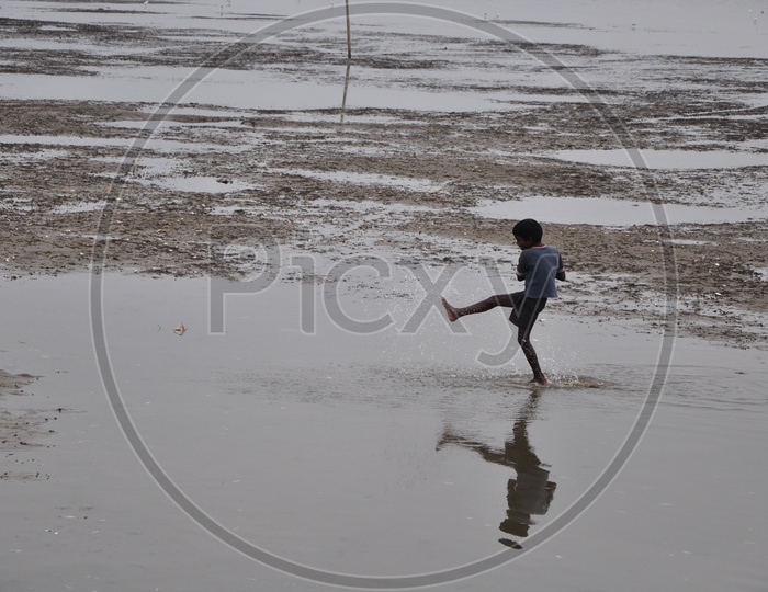 Kid playing in Water
