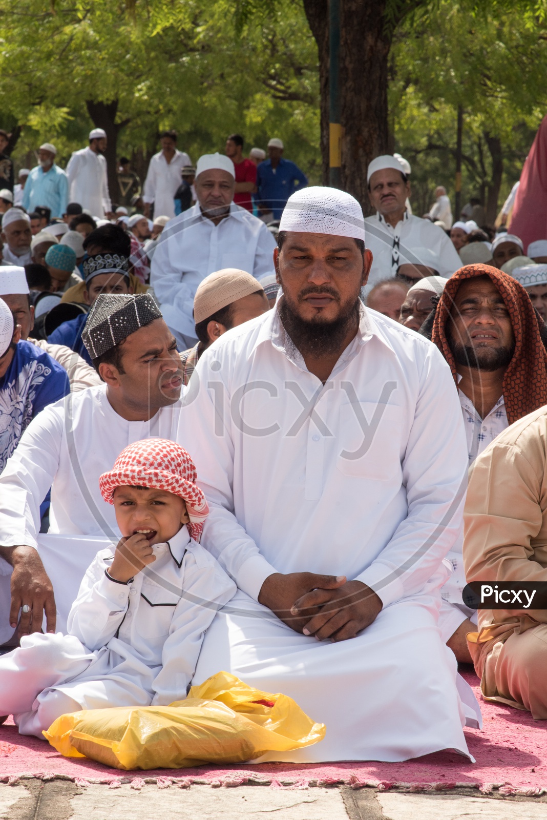 Father & Son at Eid prayer meet in Hyderabad