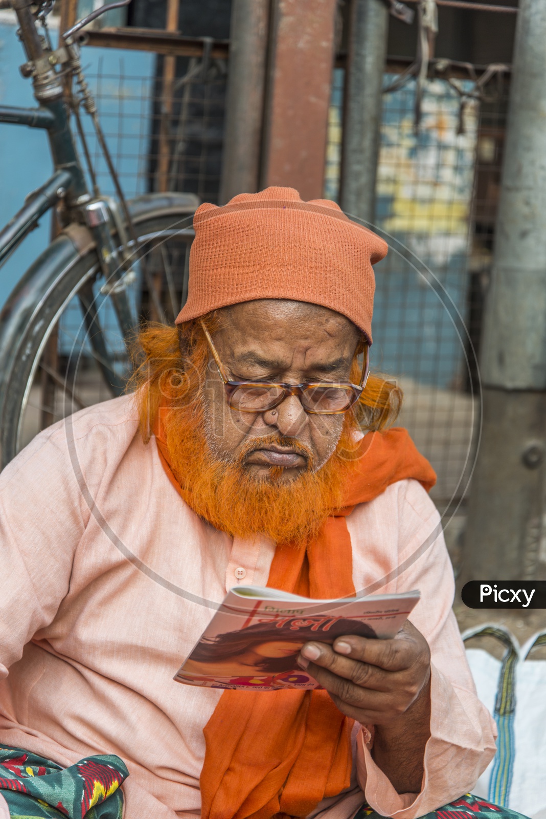 Old Muslim Man reading book