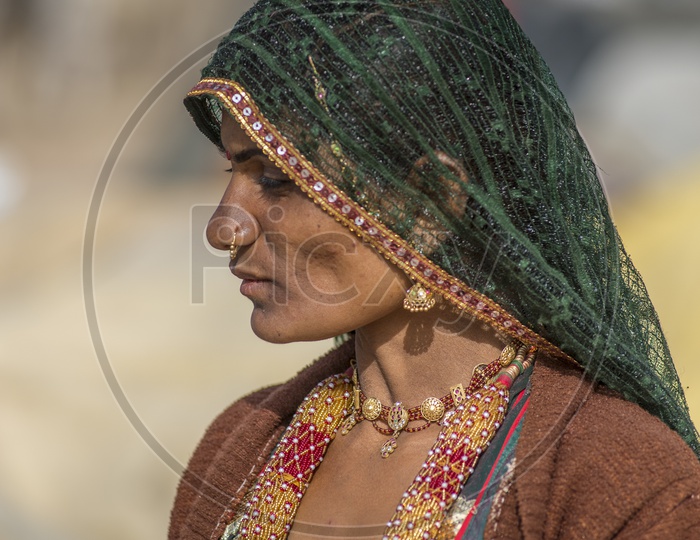 Rajasthani Woman Carrying water pot on her head