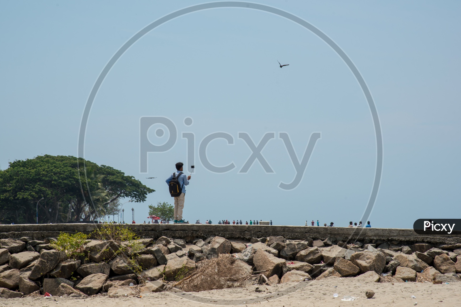 A tourist documenting Fort Kochi Beach,Kerala.