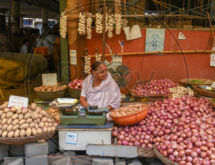Woman Vegetable Vendor in a Market in Pune