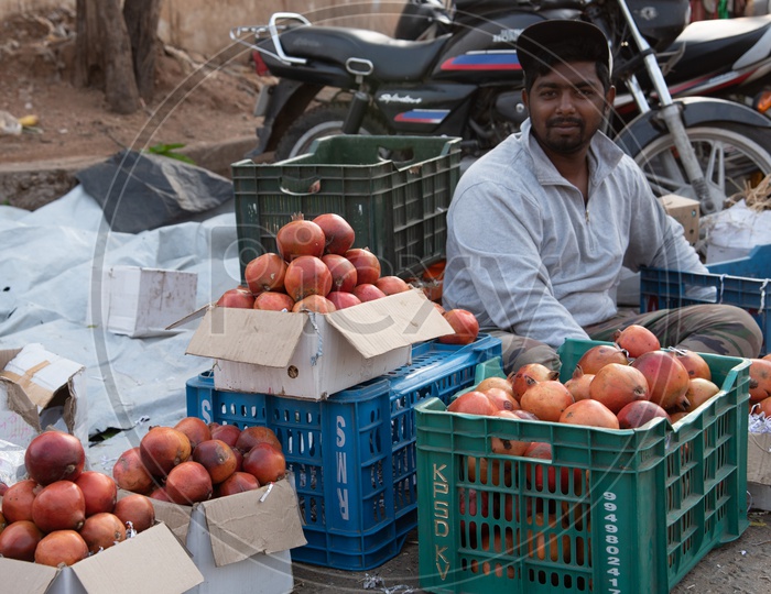 Pomegranate fruit vendor