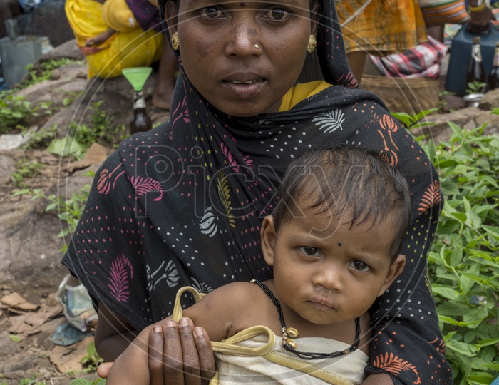 Woman with her kid in Haat Market