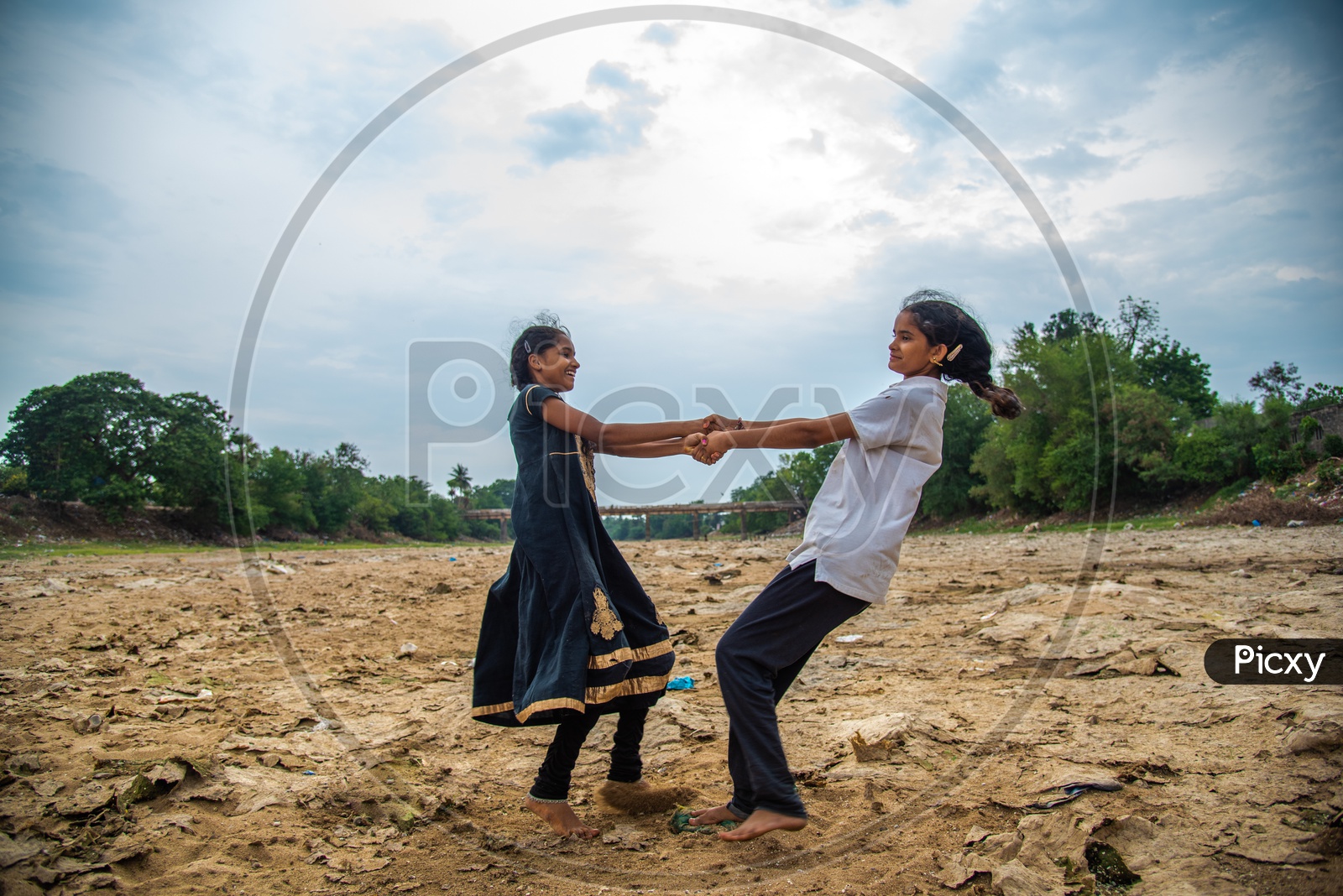 Kids Playing in a dried up Madras Canal near Revendrapadu, Guntur District