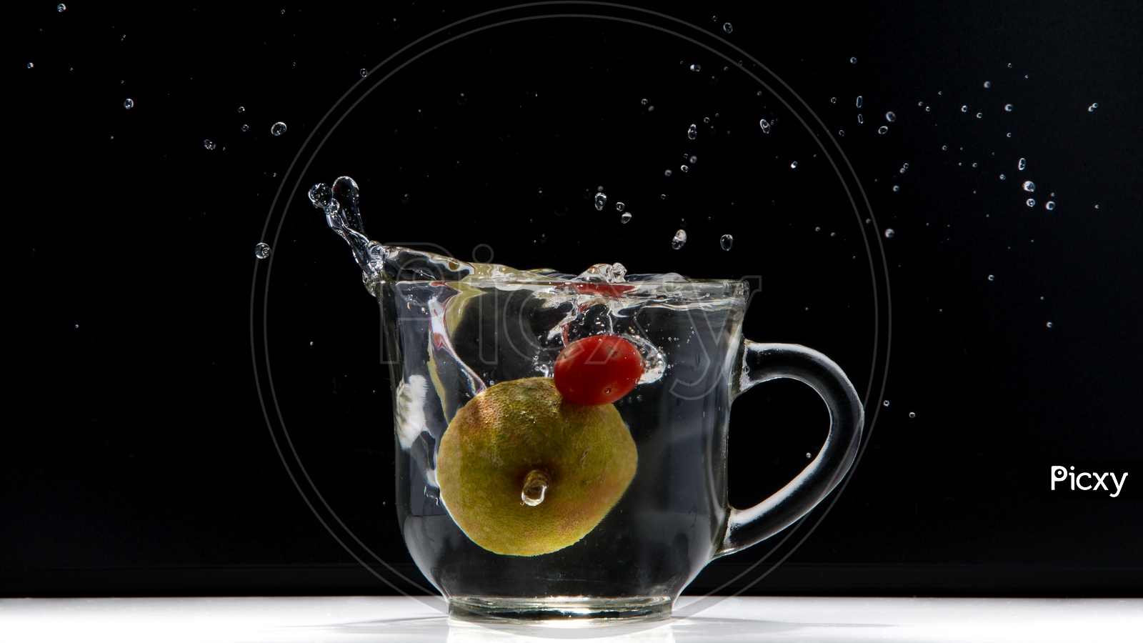 Fruits dropped into water