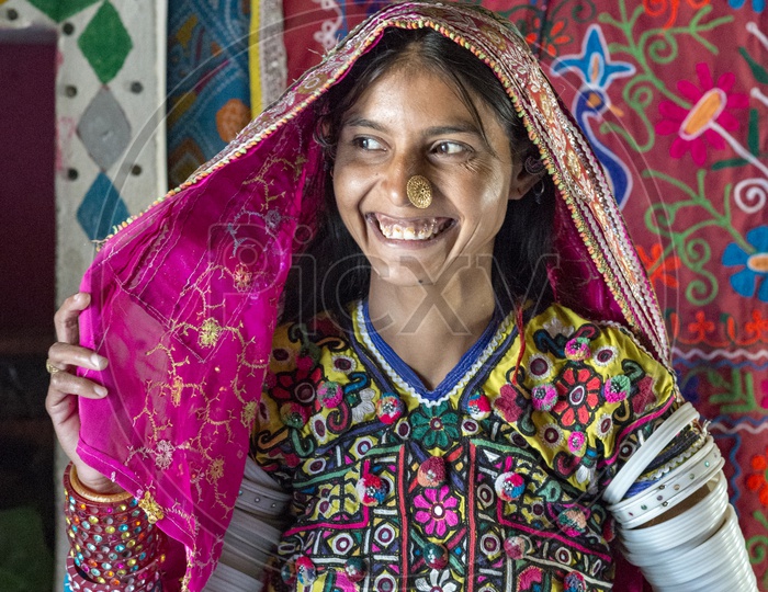Smiling Girl in Traditional Dress at Bhirandiyara Village, Kutch
