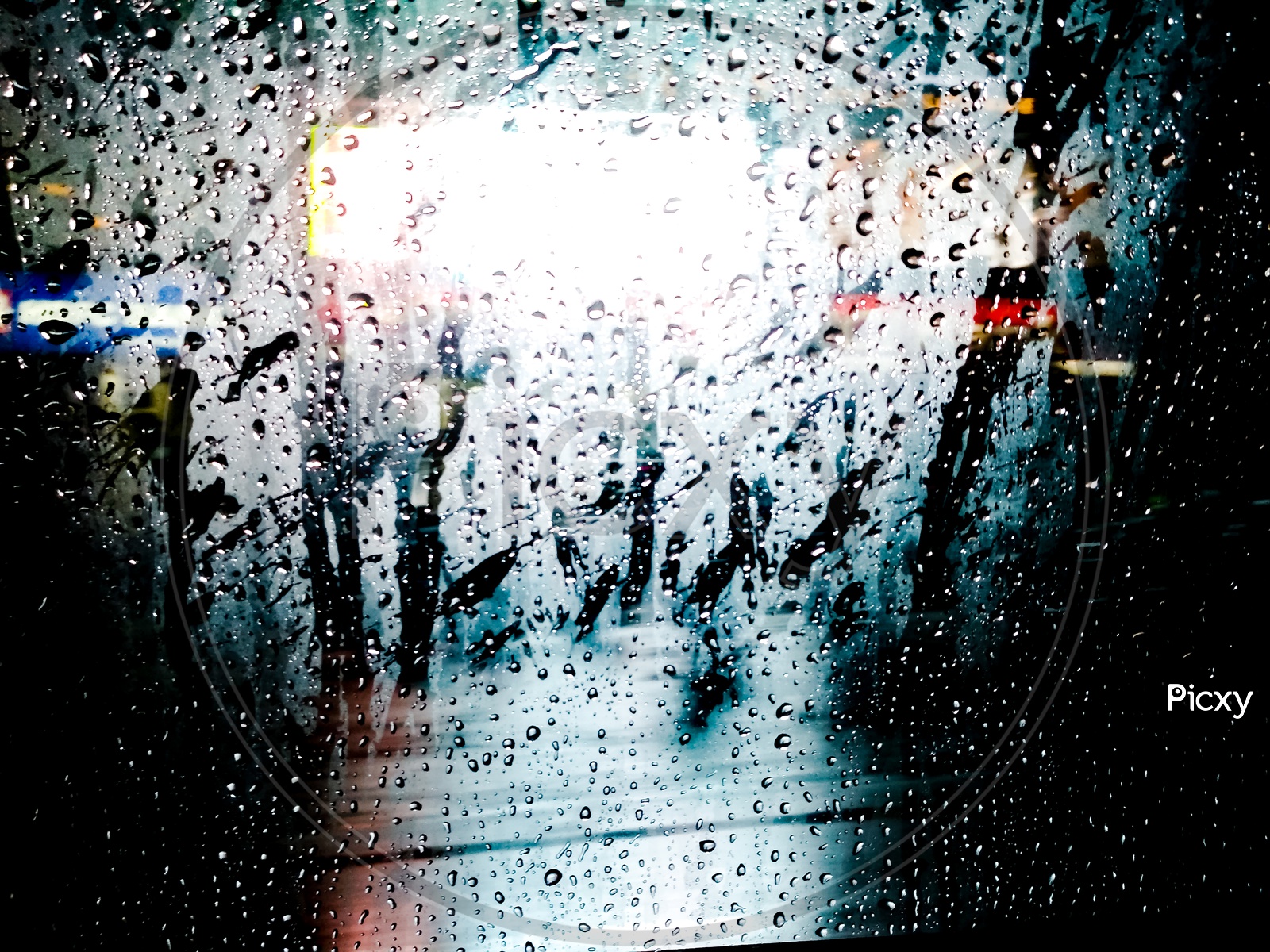 A scary rainy day. rain drops on glass
