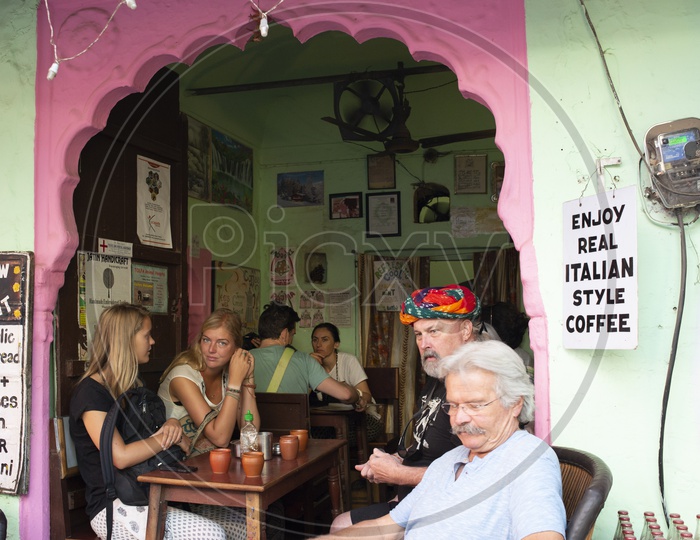 Foreign Tourists in a Italian Style Coffee Shop at Pushkar, Rajasthan