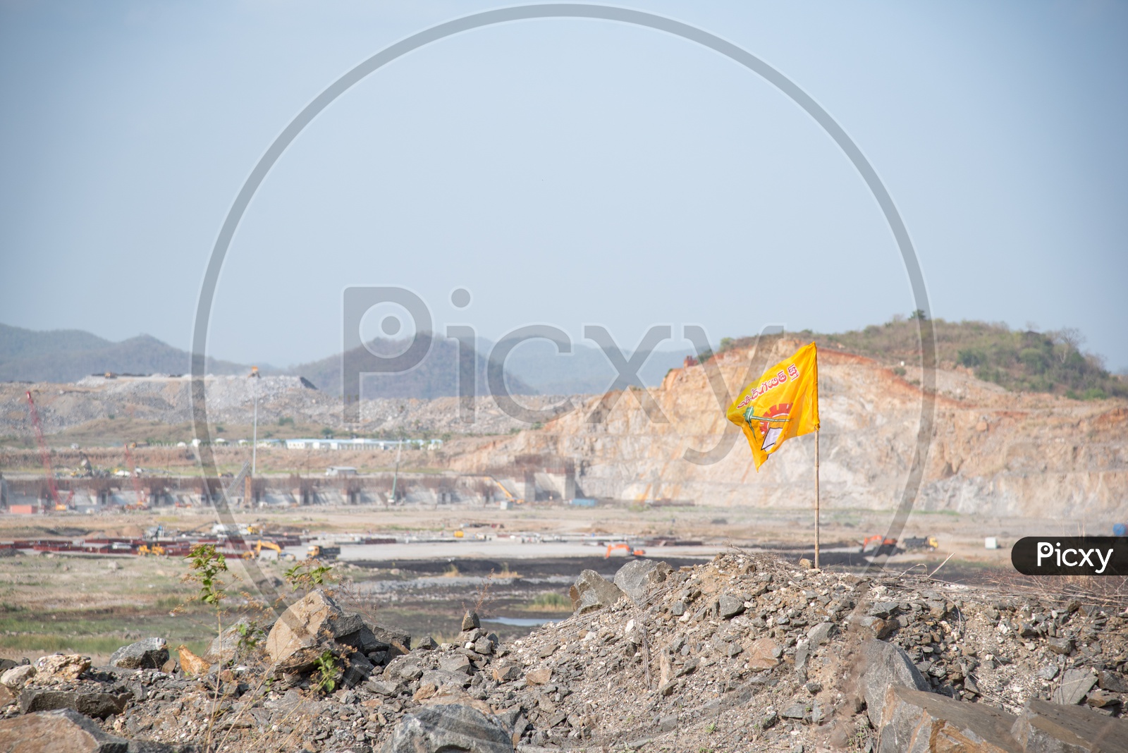 TDP party Flag at Polavaram Irrigation project Dam Site.