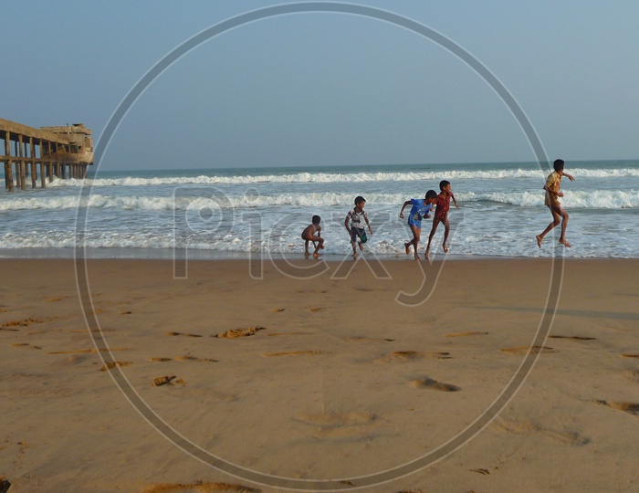 Kids playing at Mogadalapadu Beach