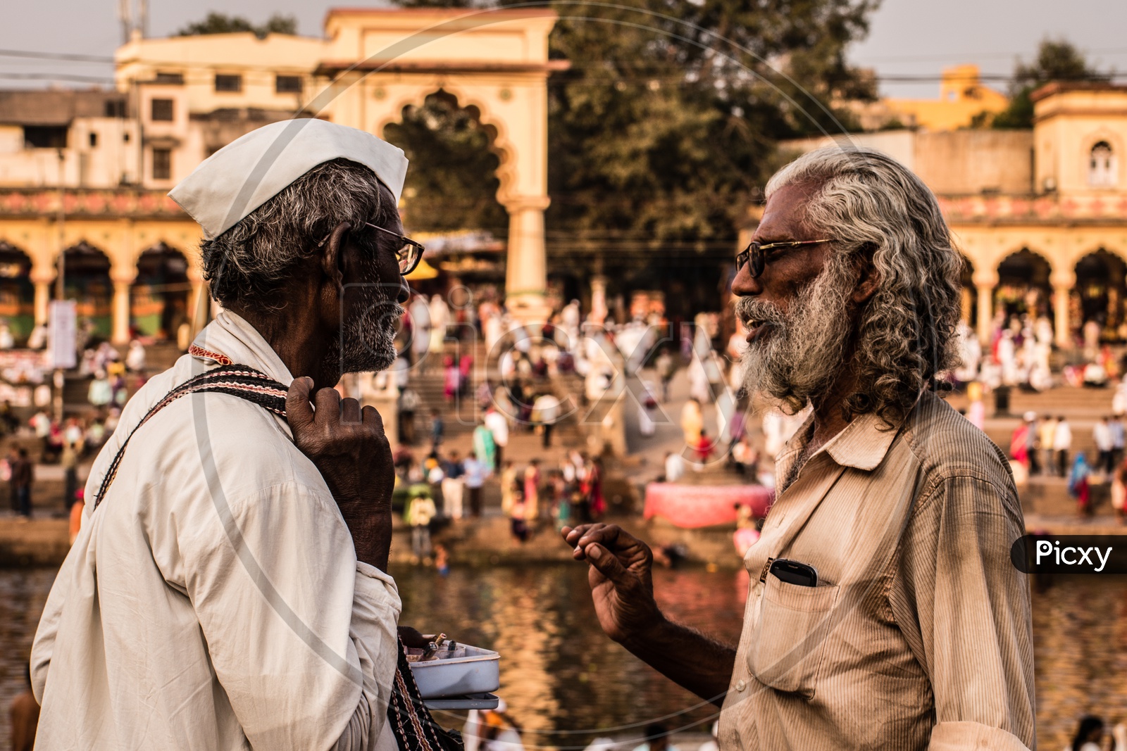 Two old man talking on streets