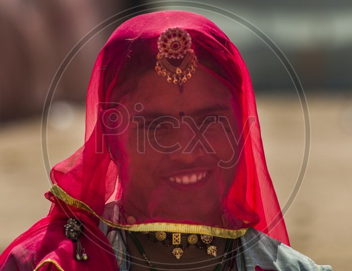 Smiling Rajasthani Woman in Traditional Attire