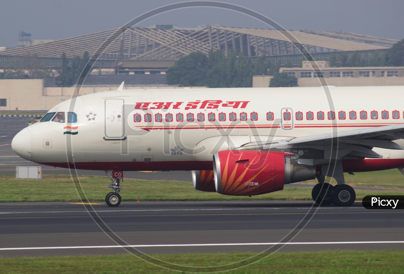 Air India A319 babybus slowing over runway 27.