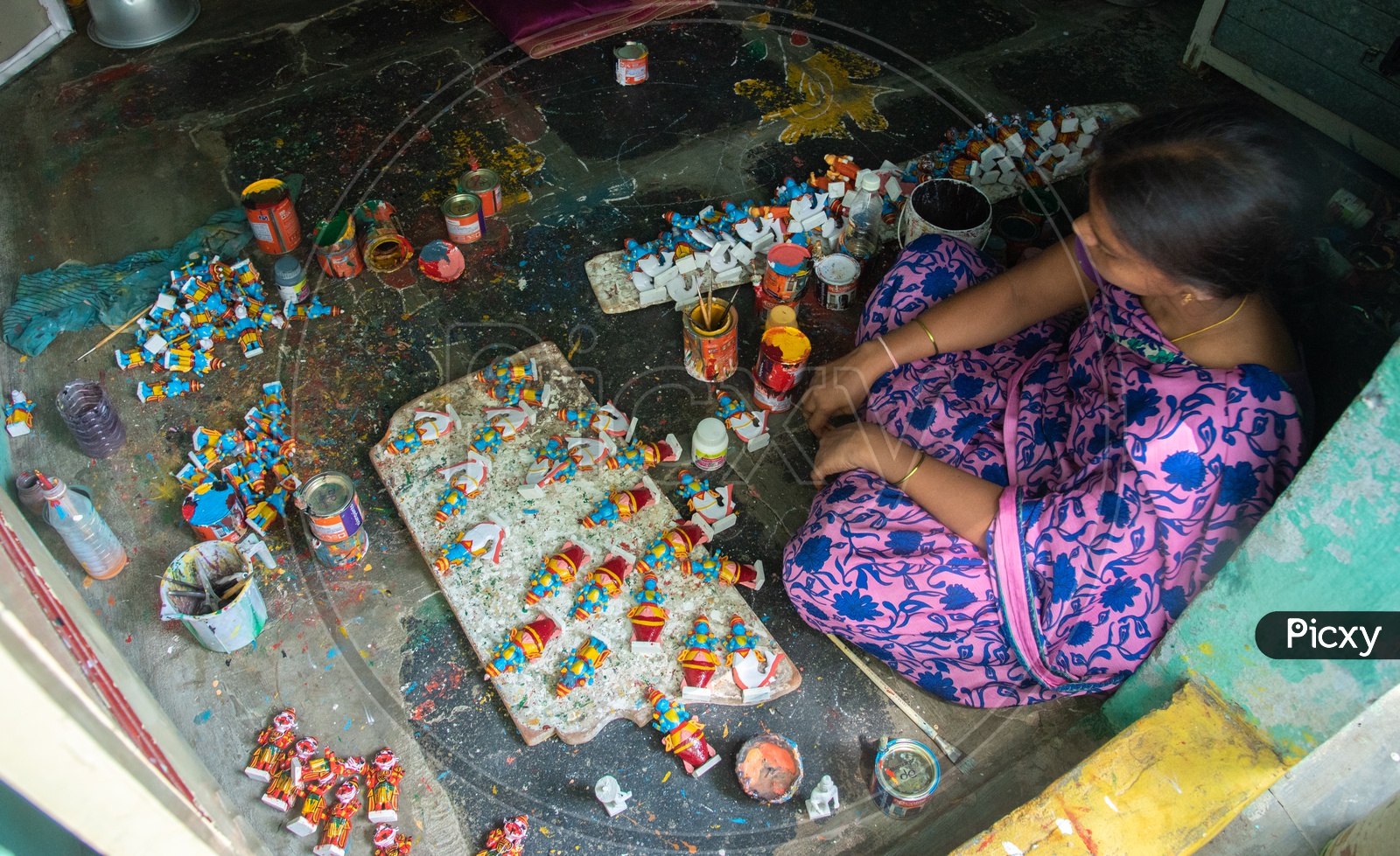 Livelyhood of Woman in Kondapally who paint the Famous  Kondapally toys.