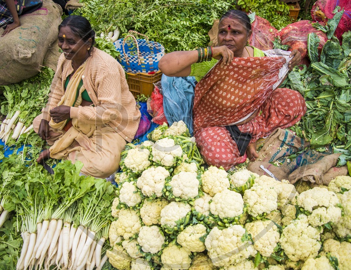 Female Vegetable Vendors at Gudimalkapur Flower Market
