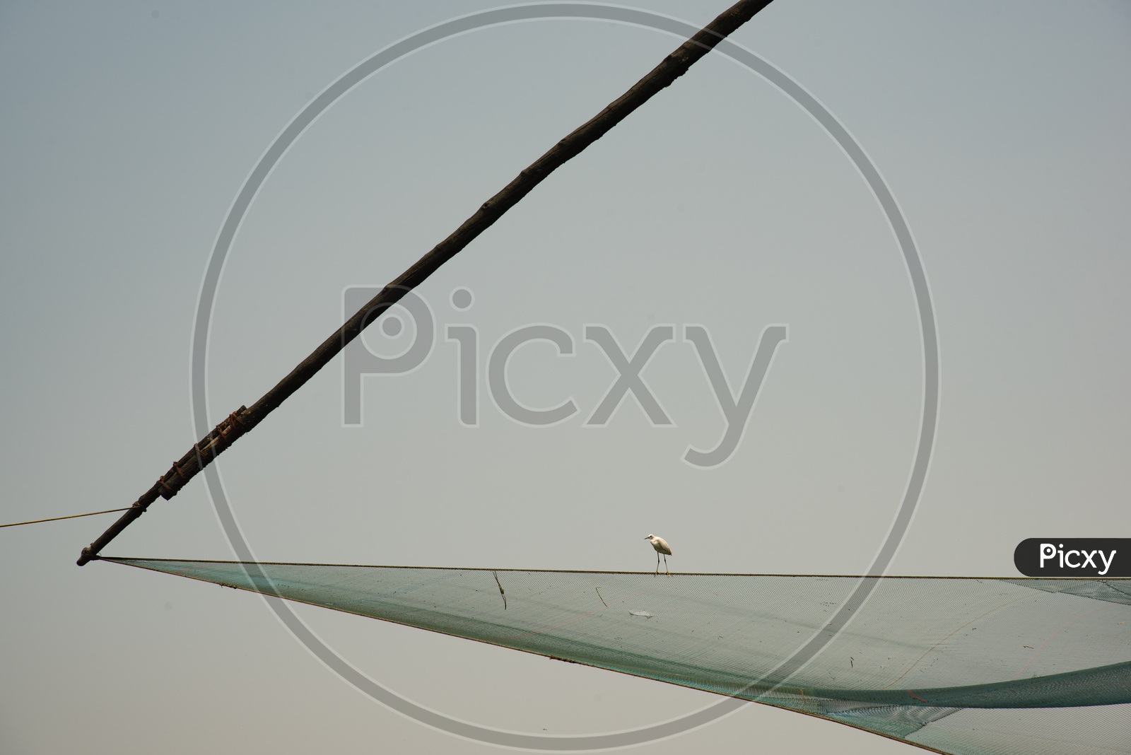 A crane on Chinese Fishing Nets at Fort Kochi Beach,Kerala.