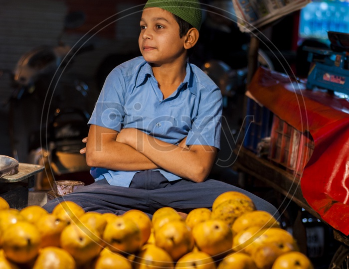 Muslim Kid Selling Mangoes