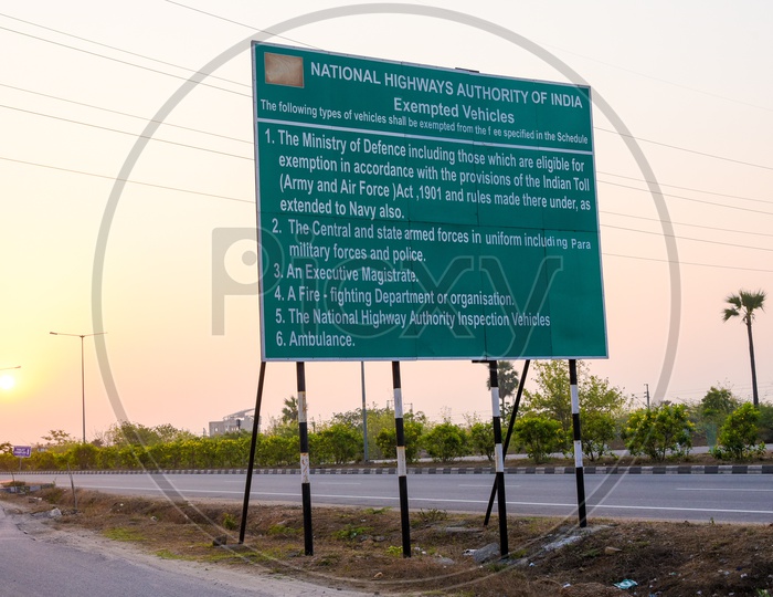 Sign board at Toll Plaza for toll exempted vehicles.