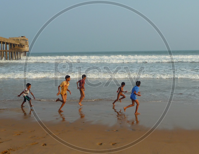 Kids playing at Mogadalapadu Beach