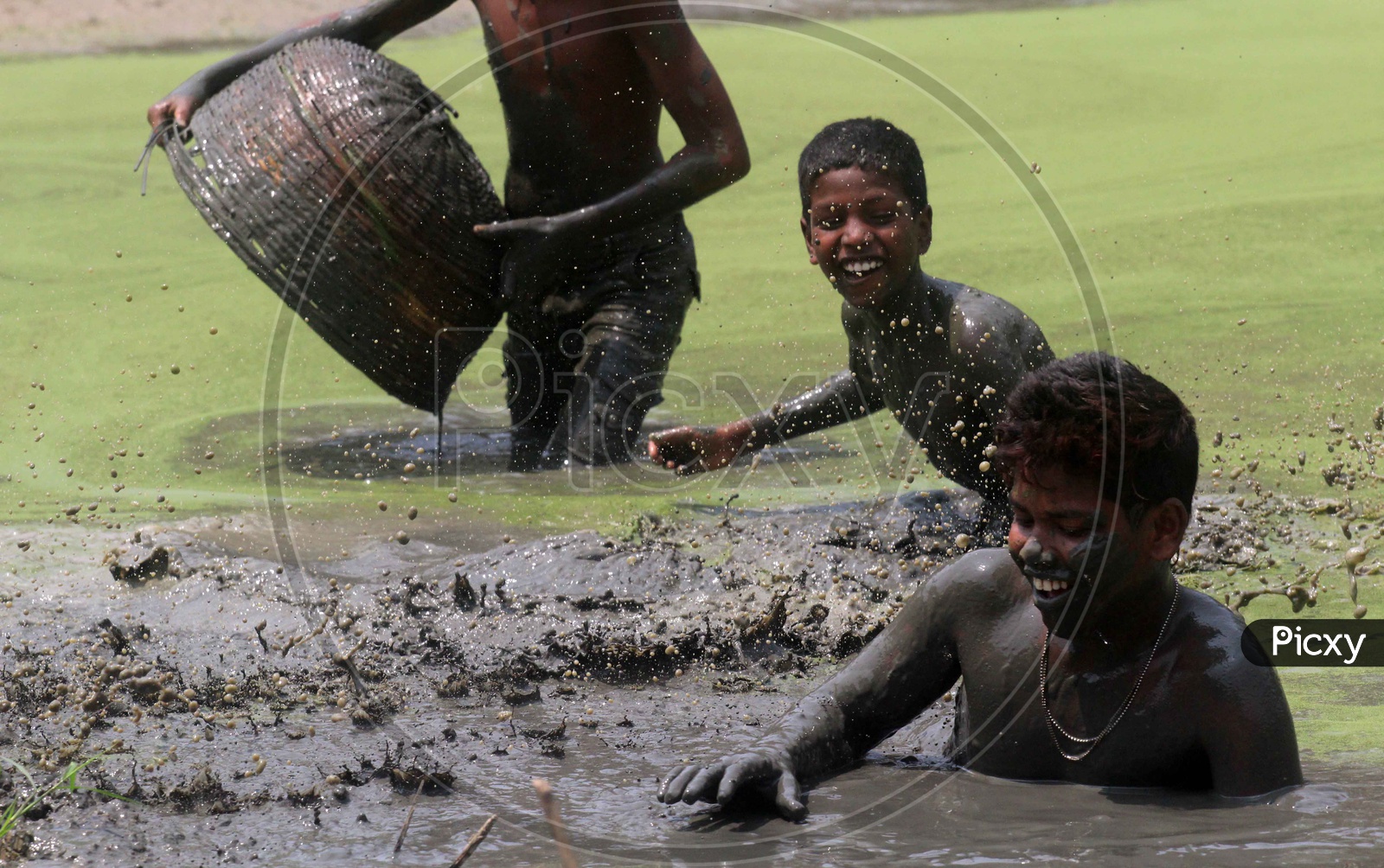 Kids in a dried pond