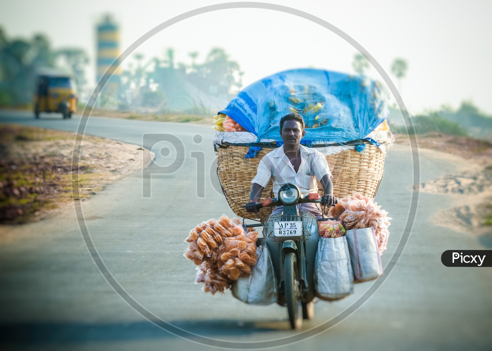Vendor carrying savories for sale in Bheemli