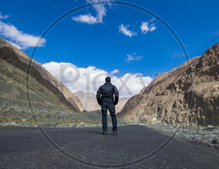 Traveller in  Hills and snowy Mountains of Leh -Ladakh