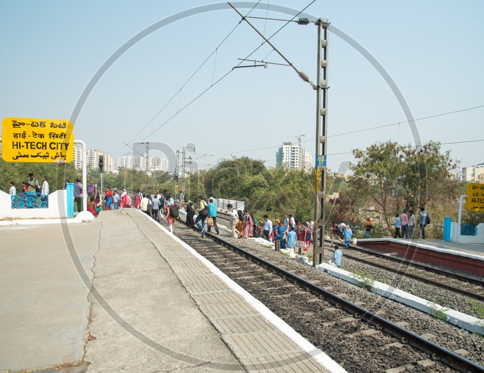 Crossing Railway Line Dangerously at a MMTS Station