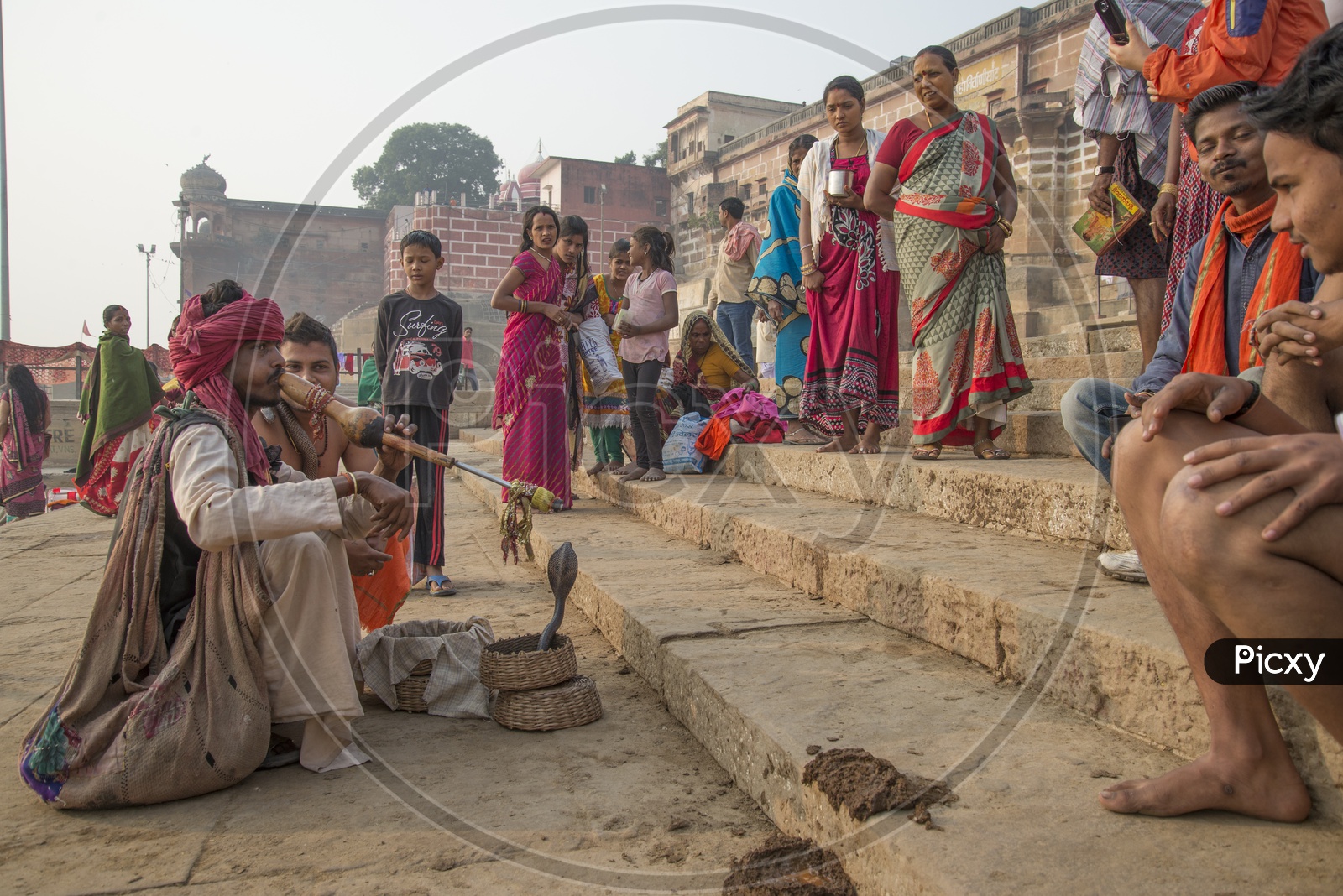 Man playing with Snake at Varanasi