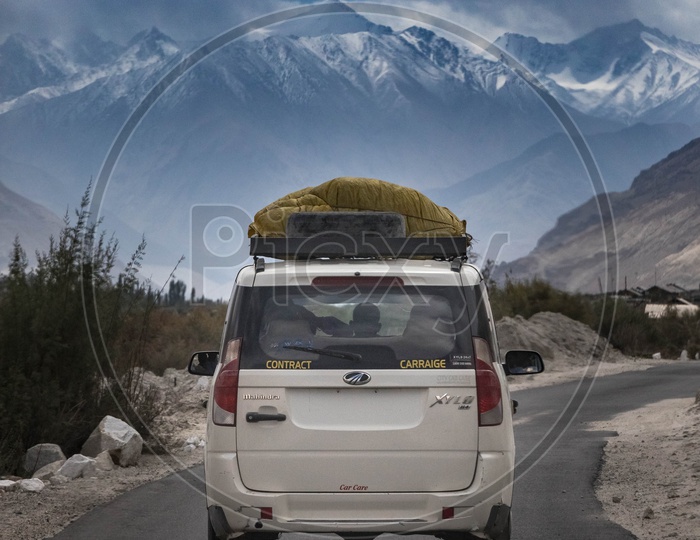 Tourist vehicle or Car on Leh Ladakh Roads.