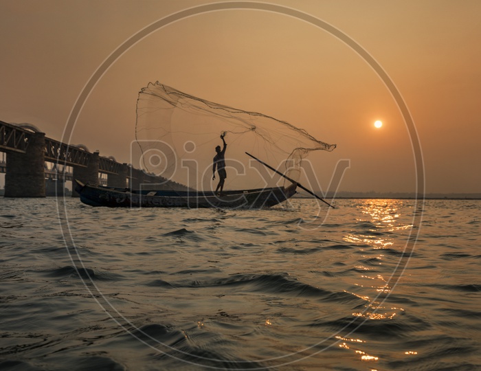 "Earth is covered a lot by water so a fisherman hopes to find a perfect place with his perfect throw."