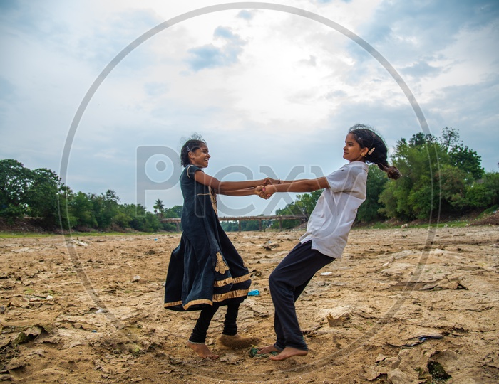 Kids Playing in a dried up Madras Canal near Revendrapadu, Guntur District