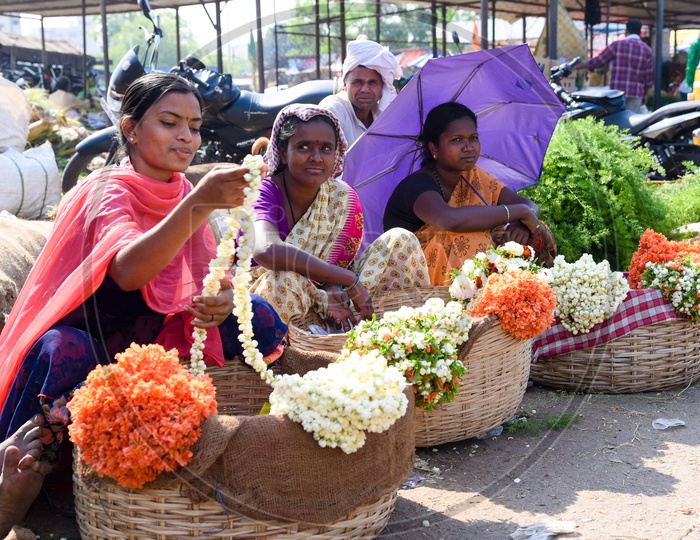 Flower vendors at Gudimalkapur flower market