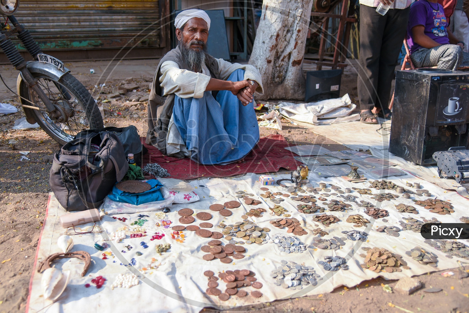 Trader at Jumeraat Bazaar Flea Market