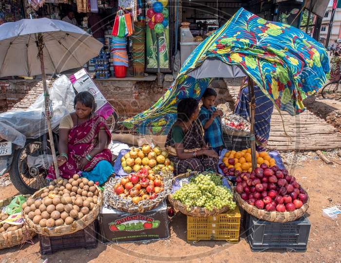 fruit vendors catch some shade