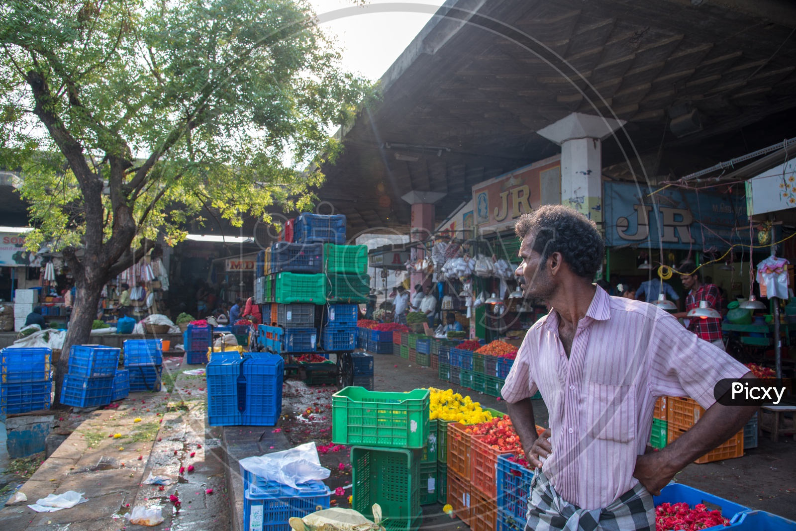 A person looks after the Flower Market.