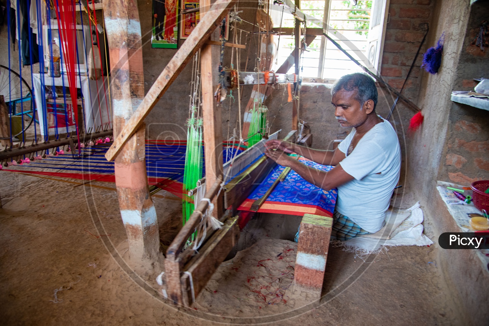 Weaver making Ikkat Handloom Saree  in Pochampally