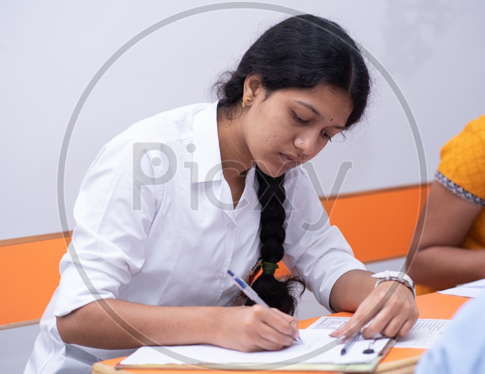 Girl writes her exam in an educational institute in Telangana