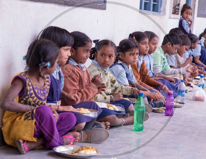 Students served Mid Day meals at a Govt School in Telangana