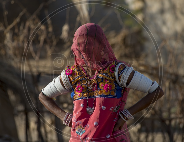 Smiling Rajasthani Woman in Tribal Attire