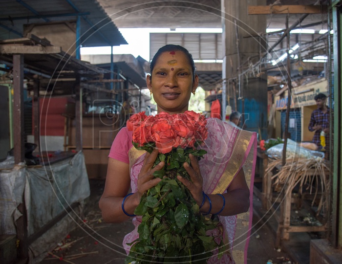 A flower vendor woman.