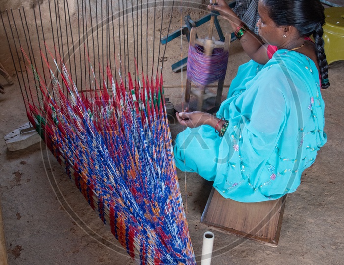 Women worker engaged in making Ikkat Handloom Saree