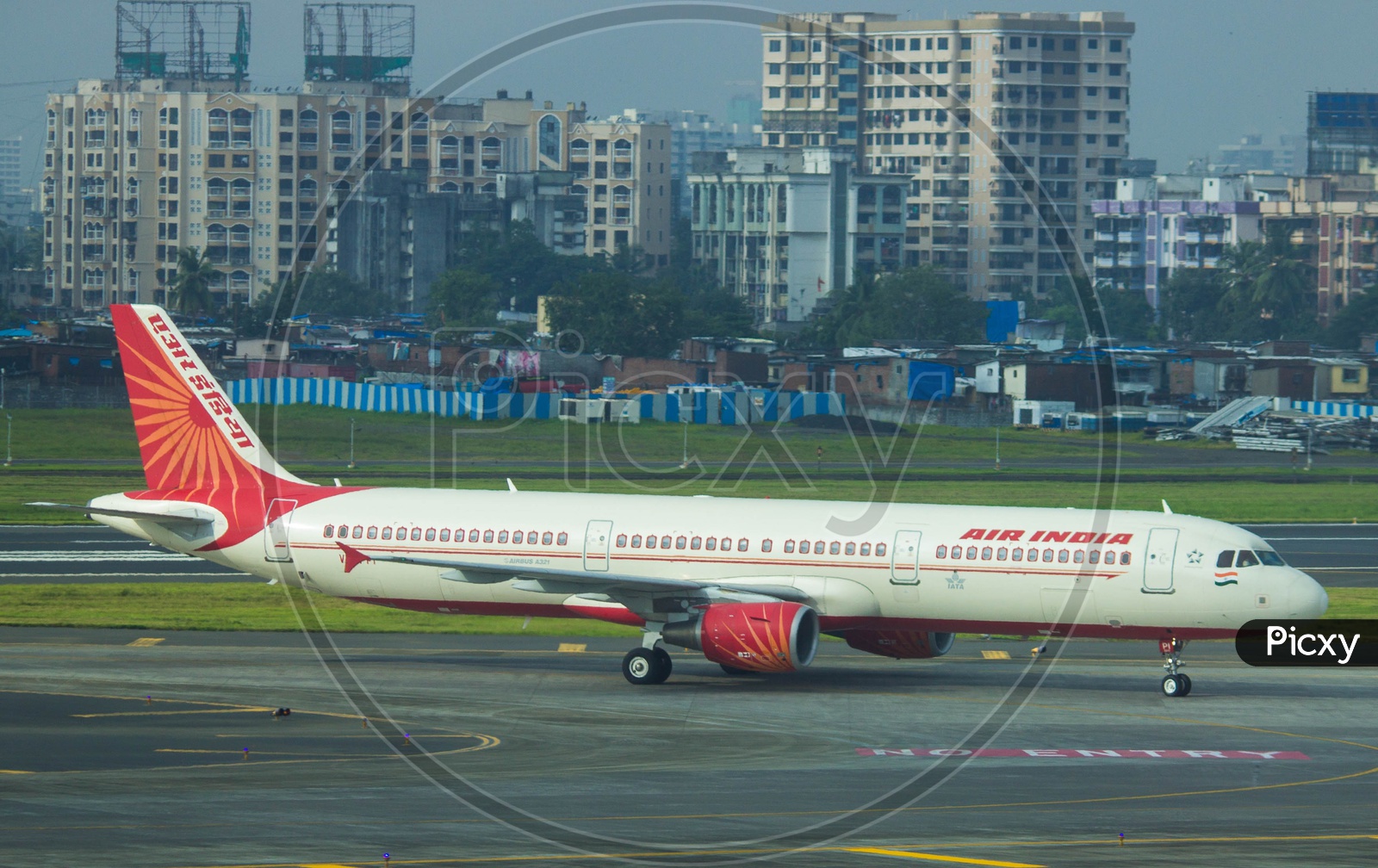 Air India A321 turning onto taxiway after completing its flight from chennai to mumbai.