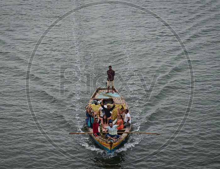 krishna river,  Happy Family on a boat.