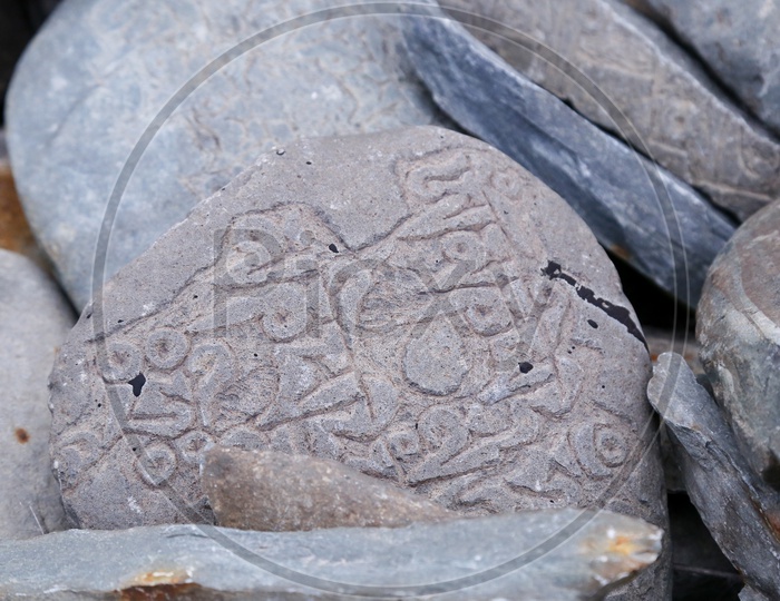 Stones with Sanskrit Script on them.