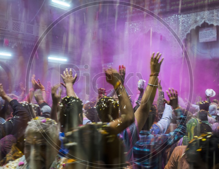 People celebrating Holi Festival in Banke Bihari Temple, Brindavan
