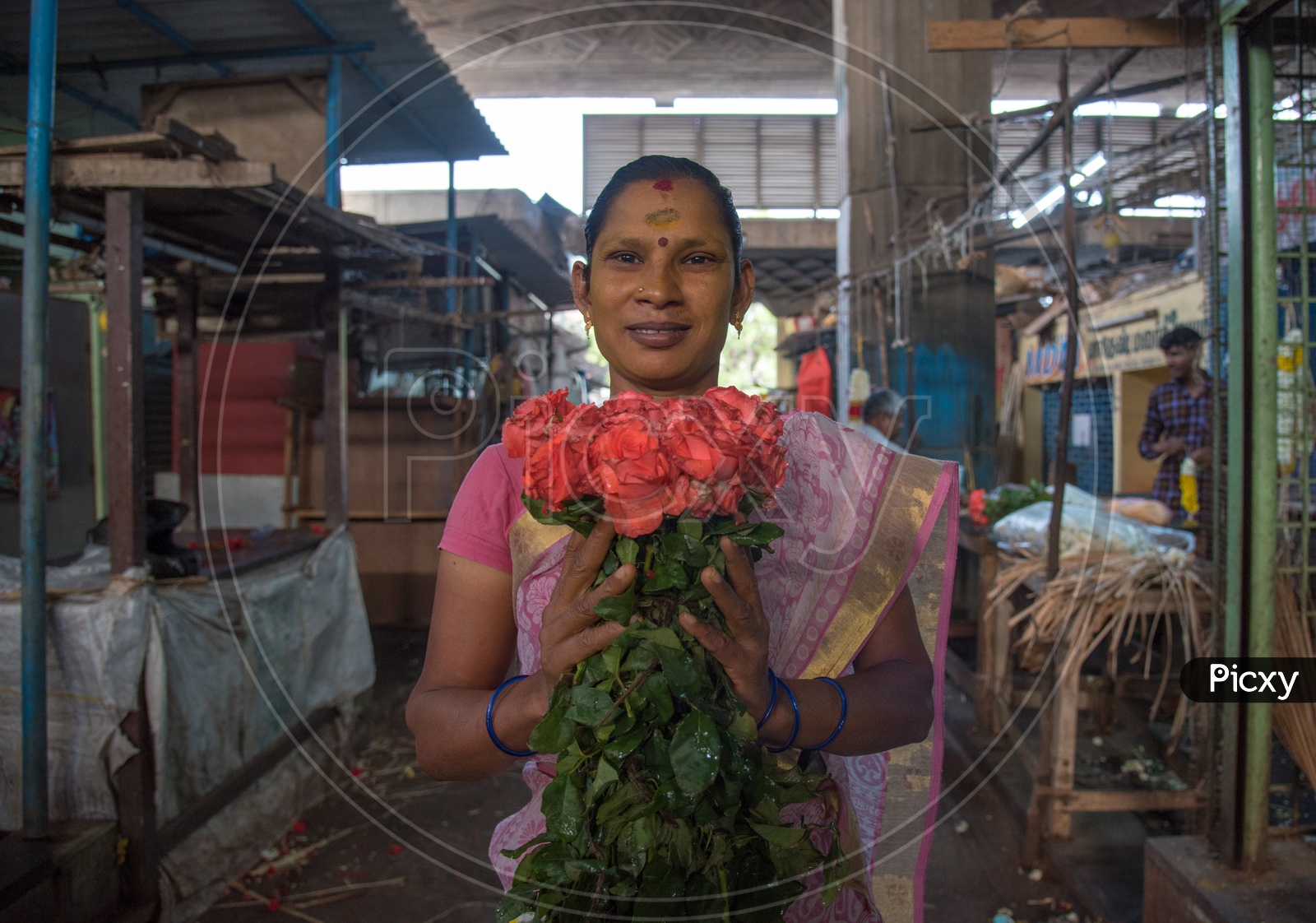 A flower vendor woman.