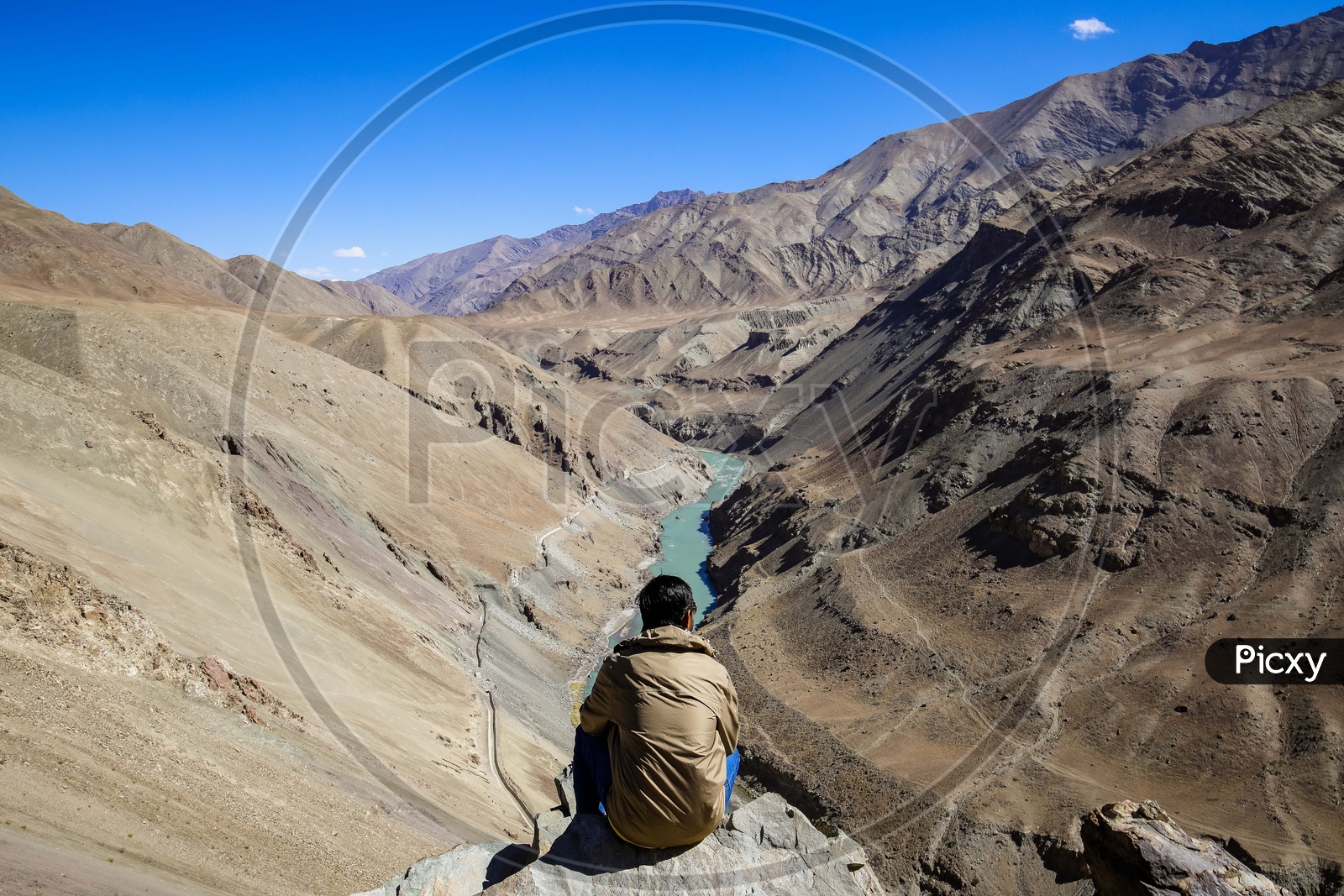 Traveller watching the Mountains of Leh Ladakh