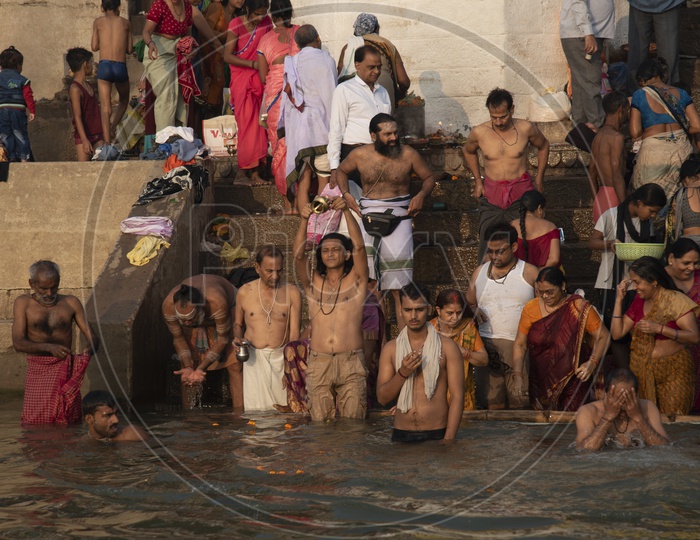 Devotees taking dip in River Ganga